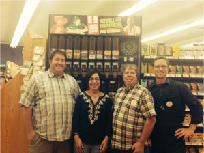 Phyllis Robinson with Matt Novick, Art Ames, and Daniel Esko (left to right) of Berkshire Co-op Market, the first co-op to join with us!